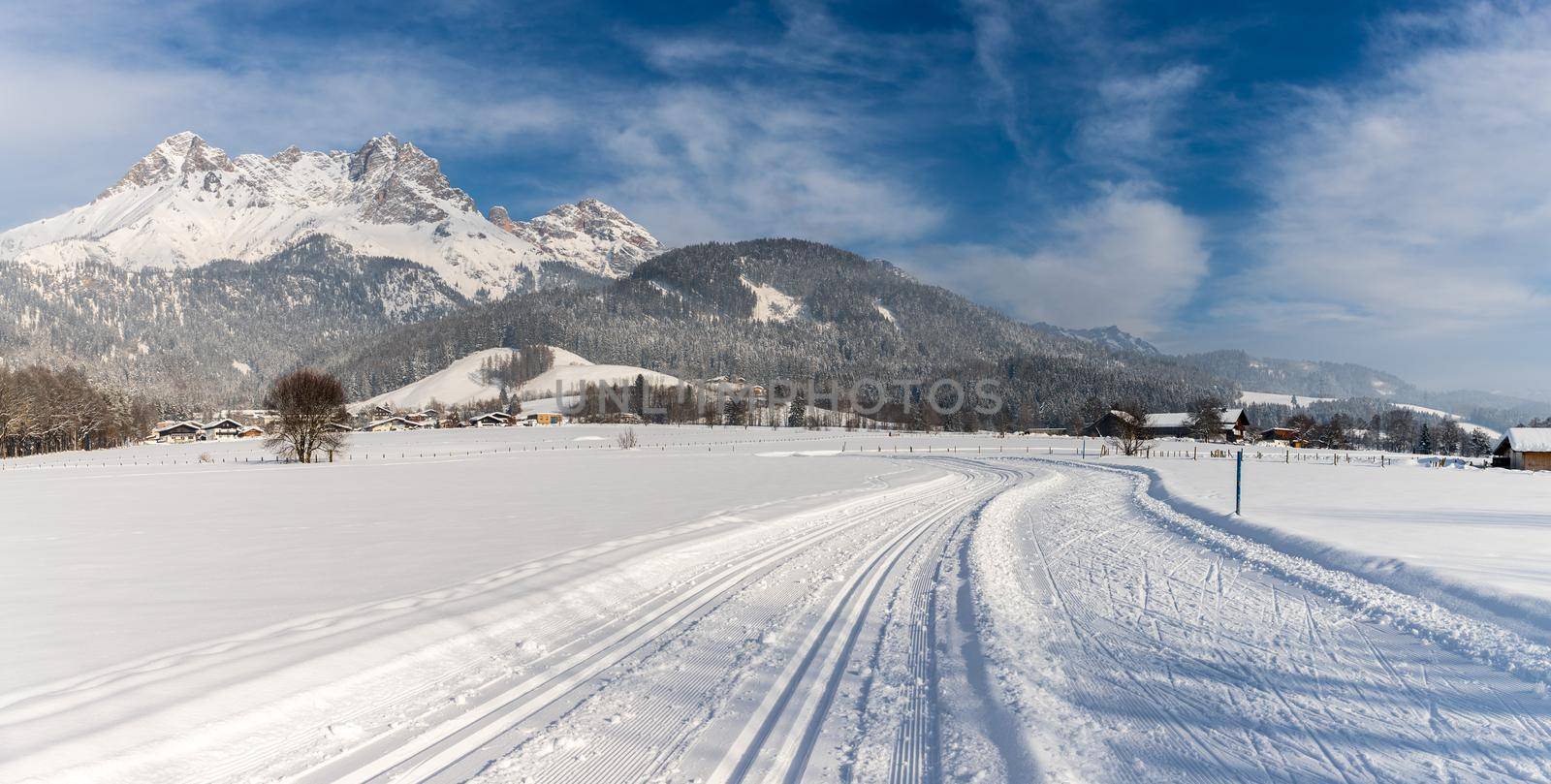 Cross-country skiing in Austria: Slope, fresh white powder snow and mountains by Daxenbichler