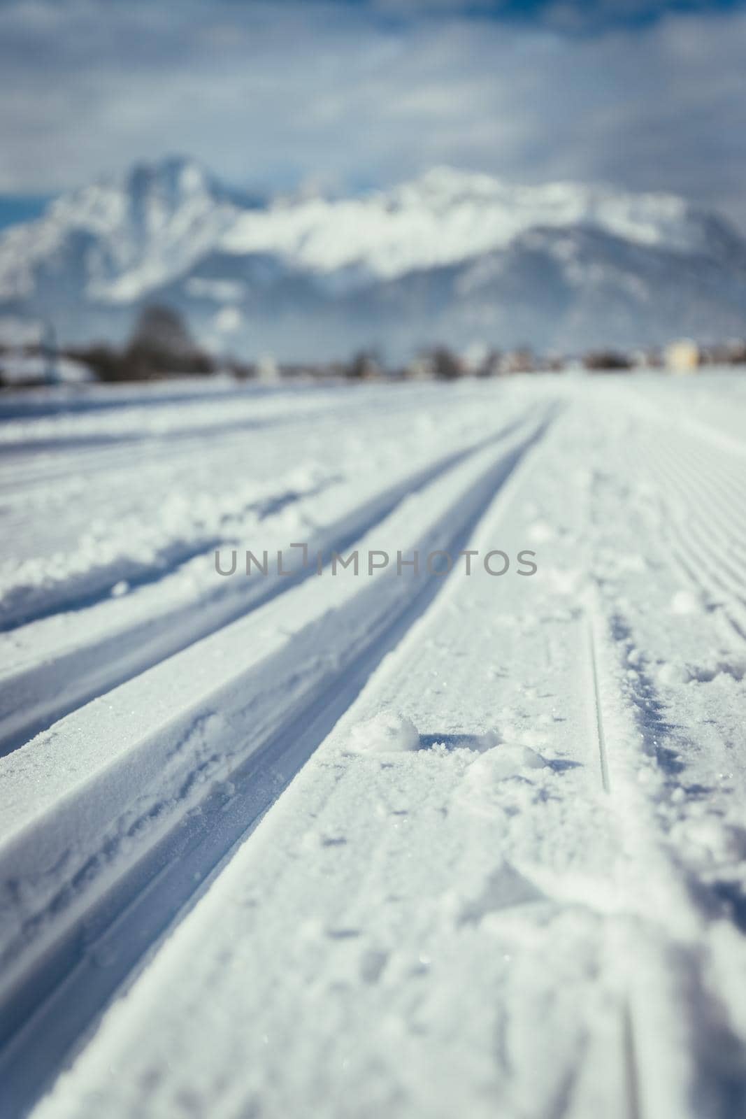 Cross-country skiing slope in Austria, beautiful mountain scenery, blurry background