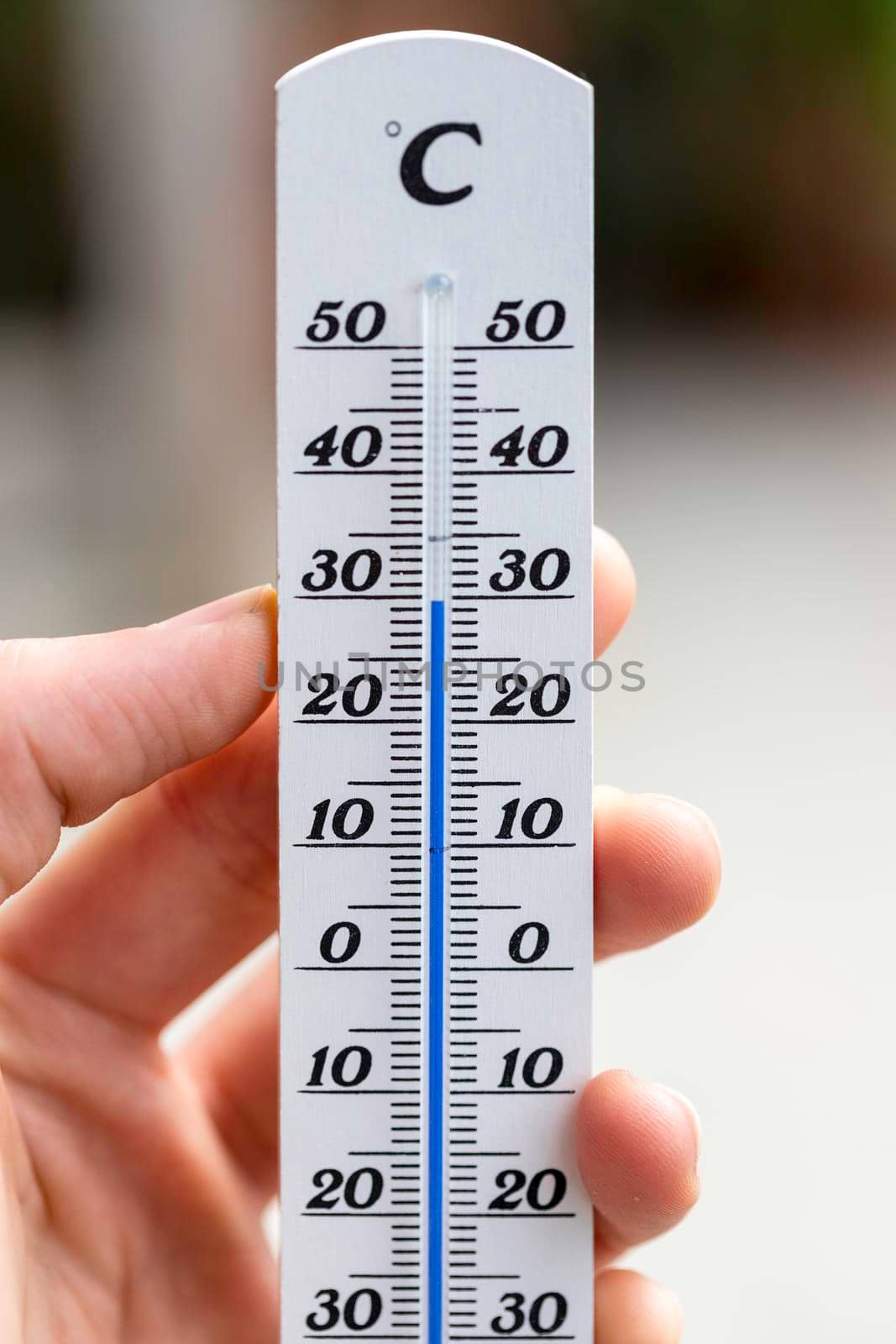 Heatwave: Thermometer in summer on a blurry background, heat by Daxenbichler