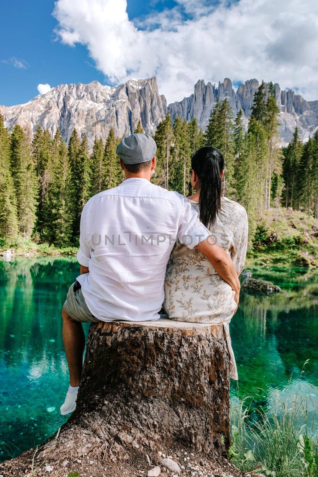 couple men and woman on vacatian in the Italian Dolomites Italy by fokkebok