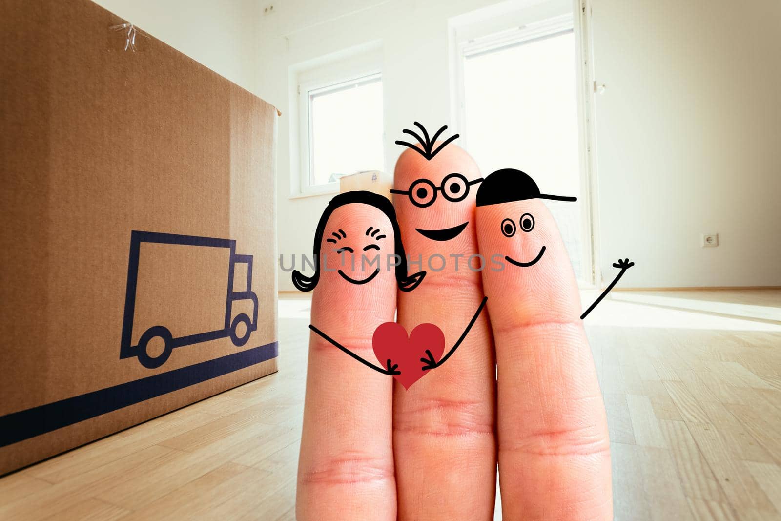Painted fingers happy family concept moving into a new home