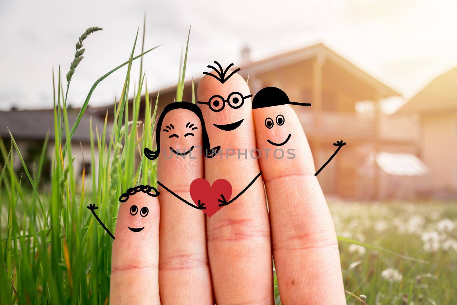 Painted fingers happy family concept moving into a new home