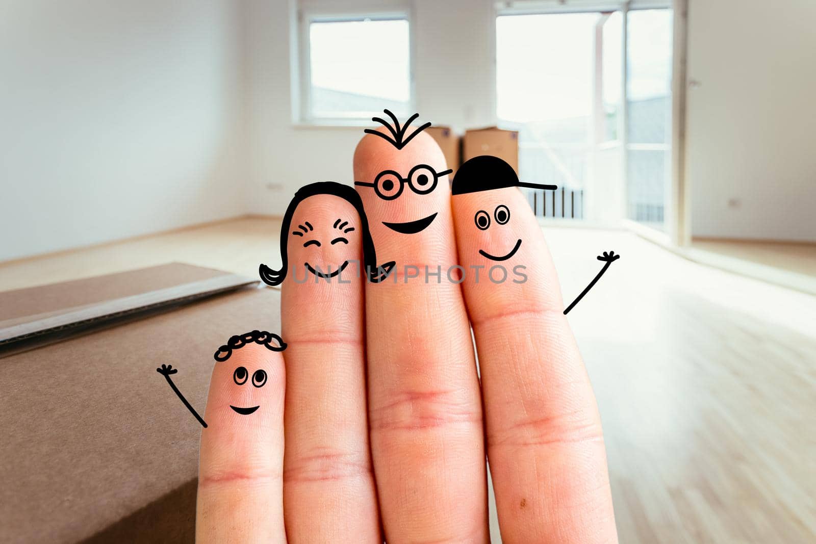 Painted fingers happy family concept moving into a new home