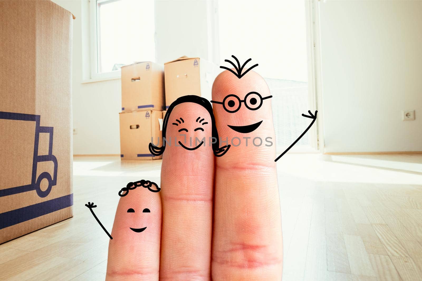 Painted fingers happy family concept moving into a new home