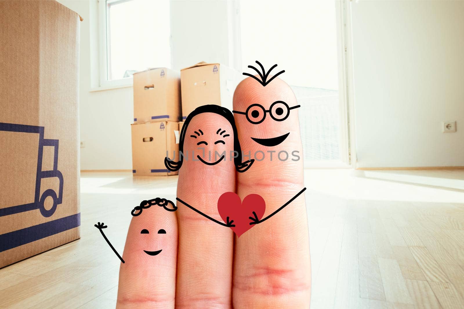 Painted fingers happy family concept moving into a new home