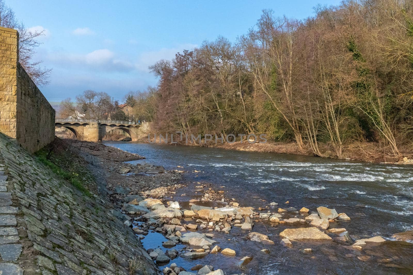 The river glan and stone bridge in Meisenheim, Germany