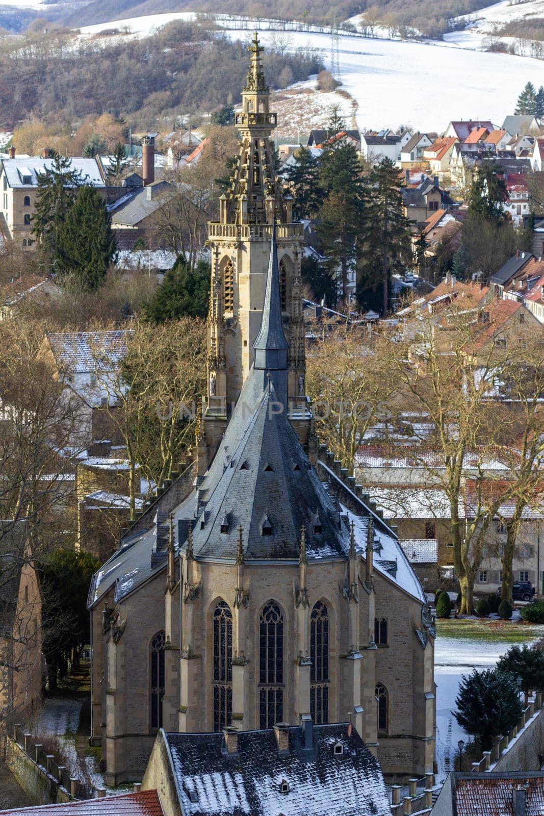 High angle view of the Schlosskirche Meisenheim, Germany in winter with snow