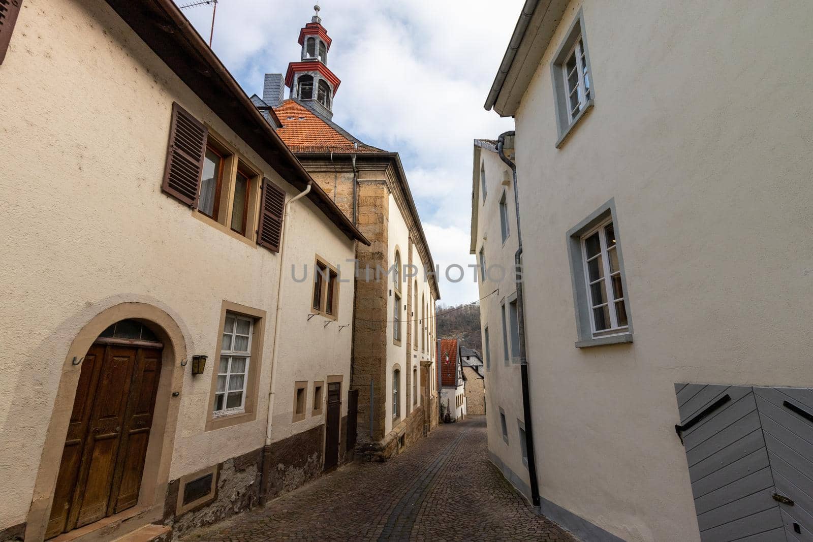 Cobbled road with historic houses in Meisenheim by reinerc