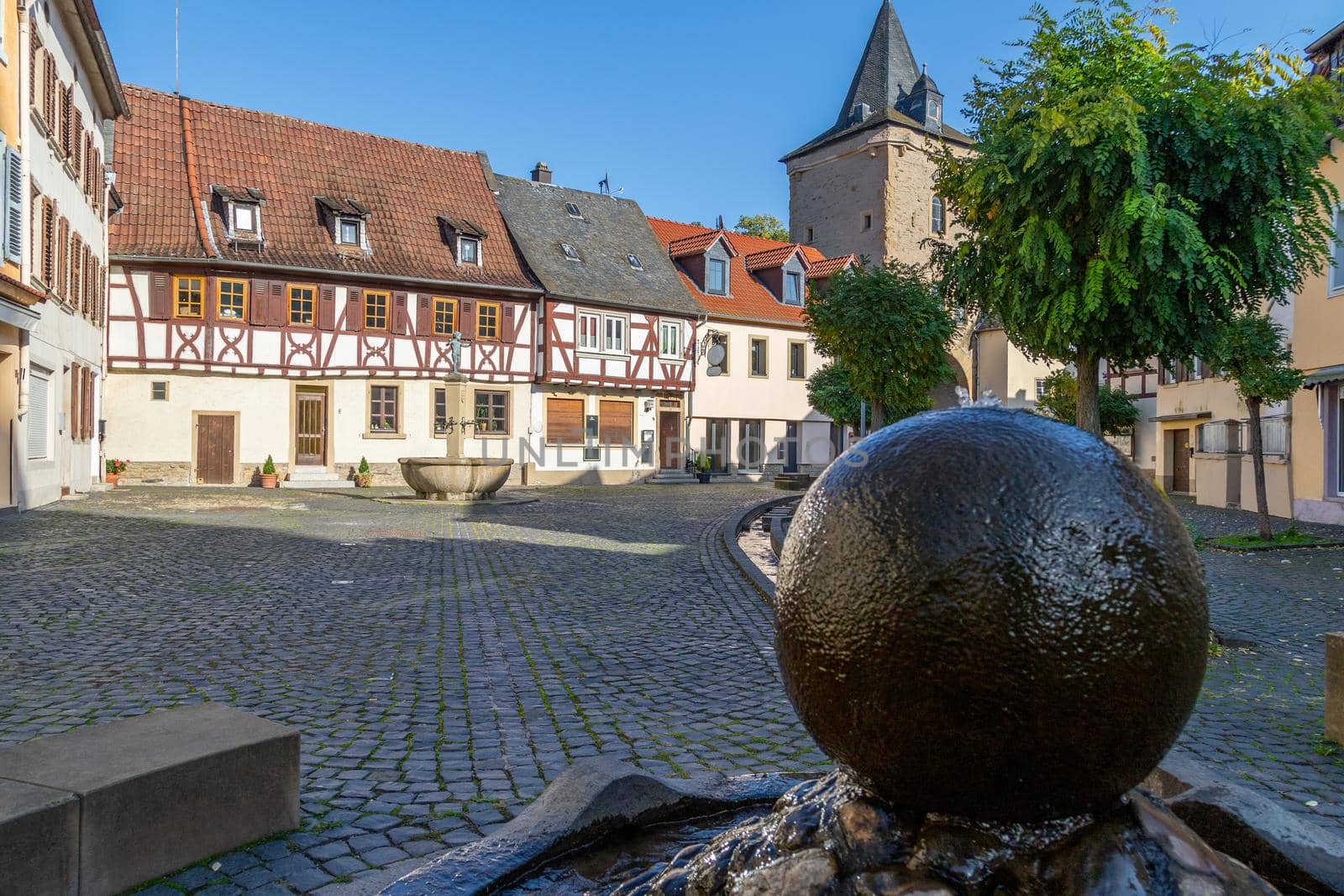 Rapportierplatz with water fountain and Untertor in Meisenheim, Germany