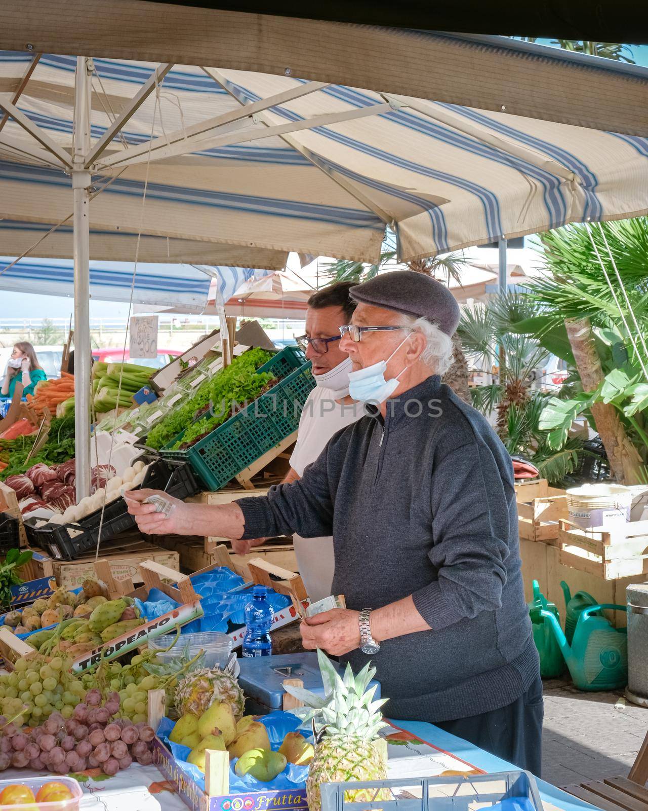 Ortigia in Syracuse Sicily Italy October 2020 in the Morning. Travel Photography from Syracuse, Italy on the island of Sicily. Cathedral Plaza and market with people wearing face protection during the 2020 pandemic covid 19 corona virus