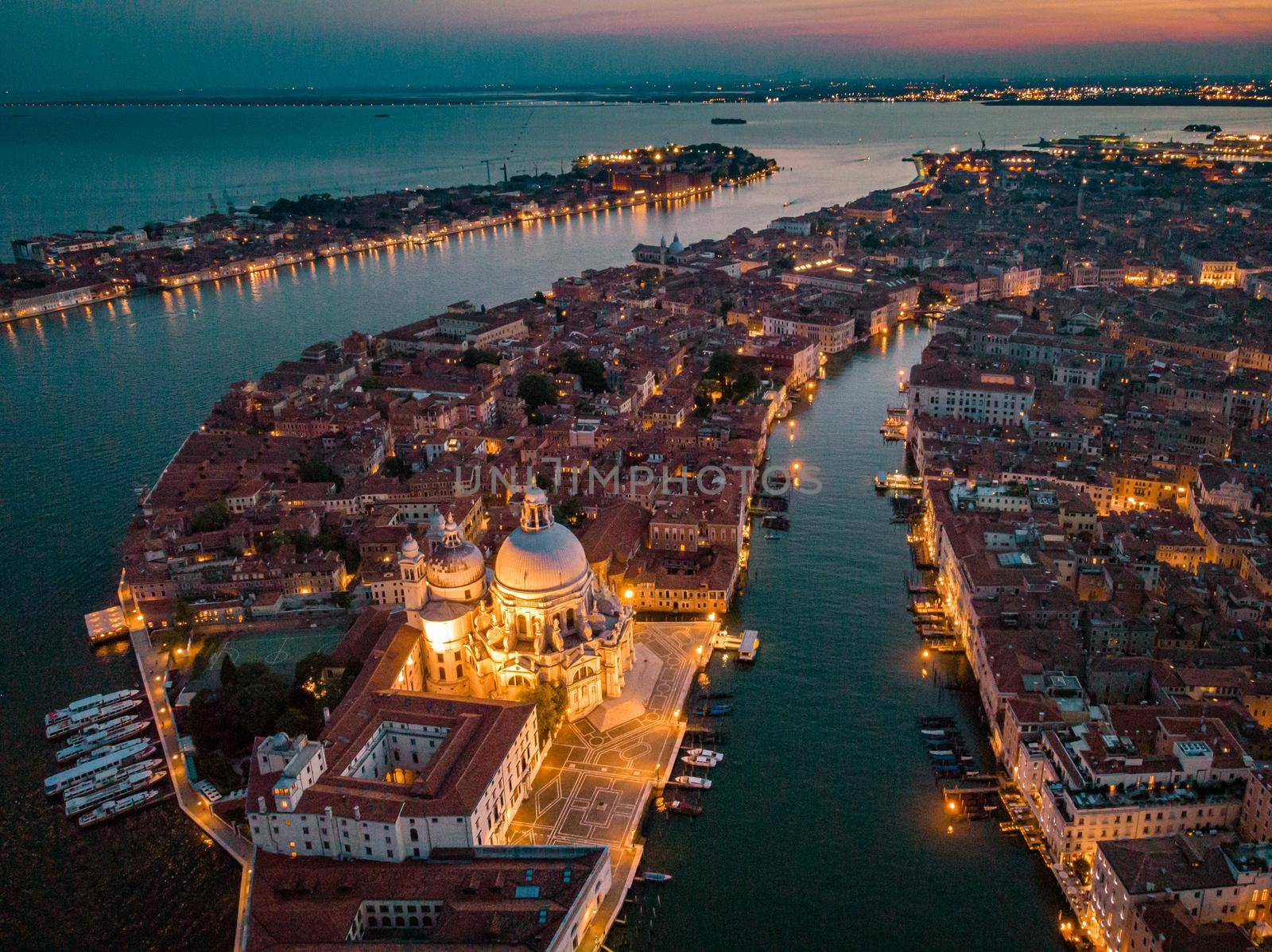 Venice from above with drone, Aerial drone photo of iconic and unique Saint Mark's square or Piazza San Marco featuring Doge's Palace, Basilica and Campanile, Venice, Italy by fokkebok