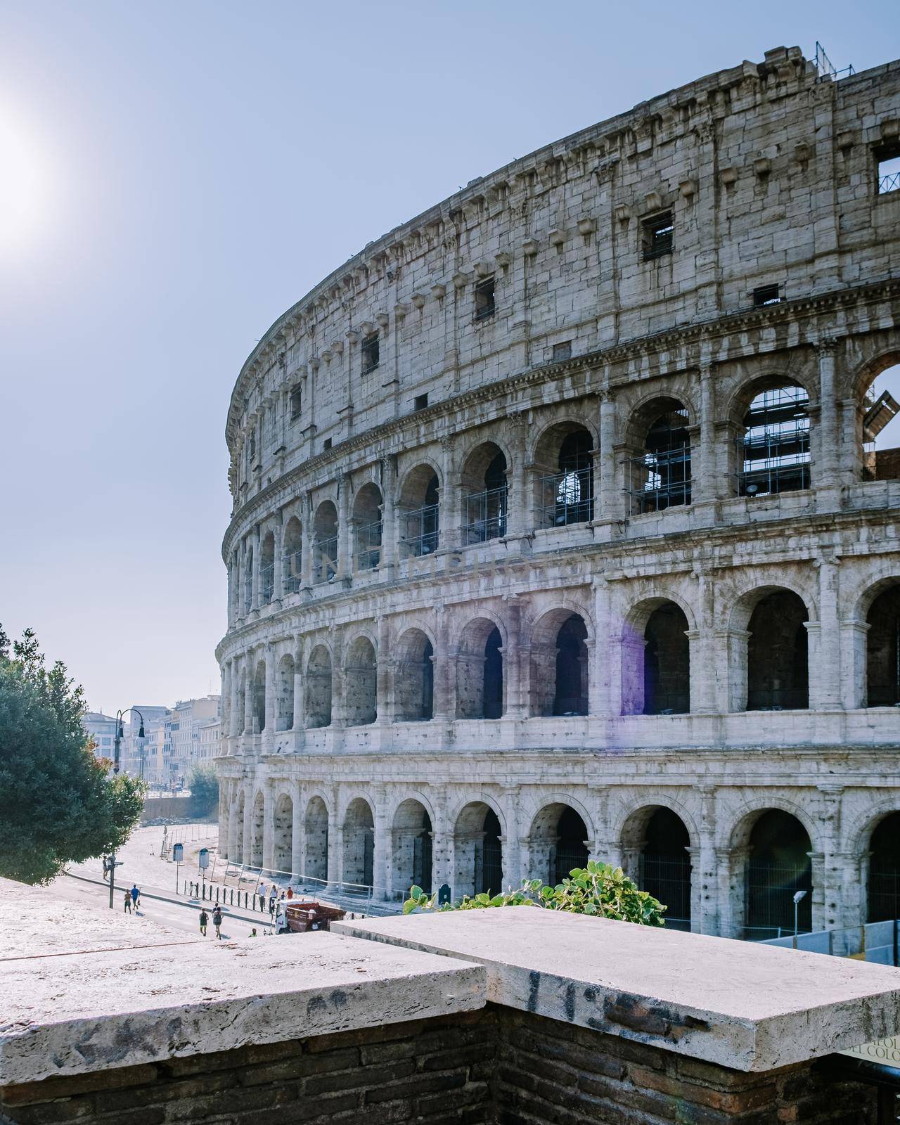 View of Colosseum in Rome and morning sun, Italy, Europe by fokkebok