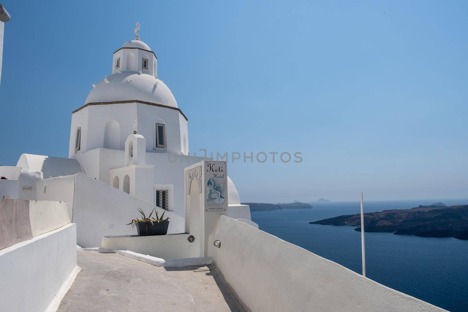 Santorini Greece August 2020,View to the sea and Volcano from Fira the capital of Santorini island in Greece by fokkebok