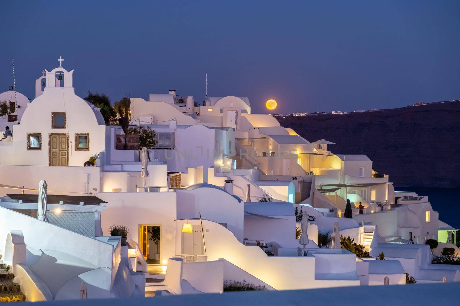 moonrise at evening at Oia Santorini Greece by fokkebok