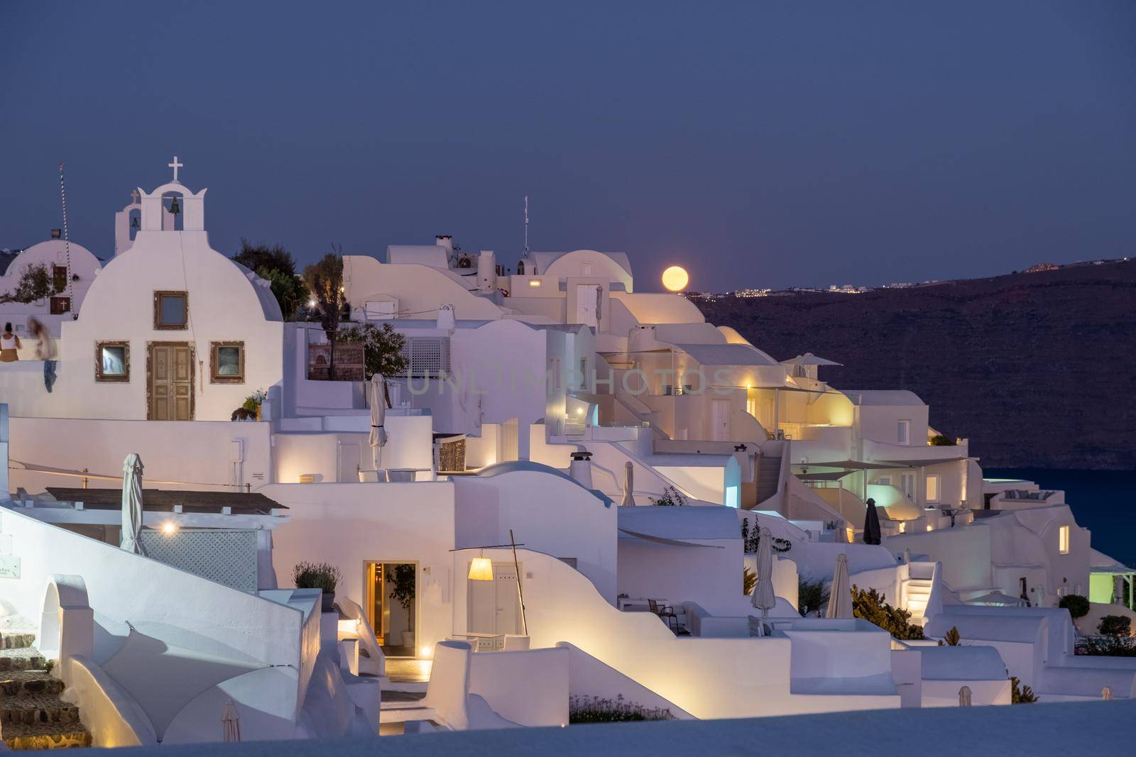 moonrise at evening at Oia Santorini Greece by fokkebok