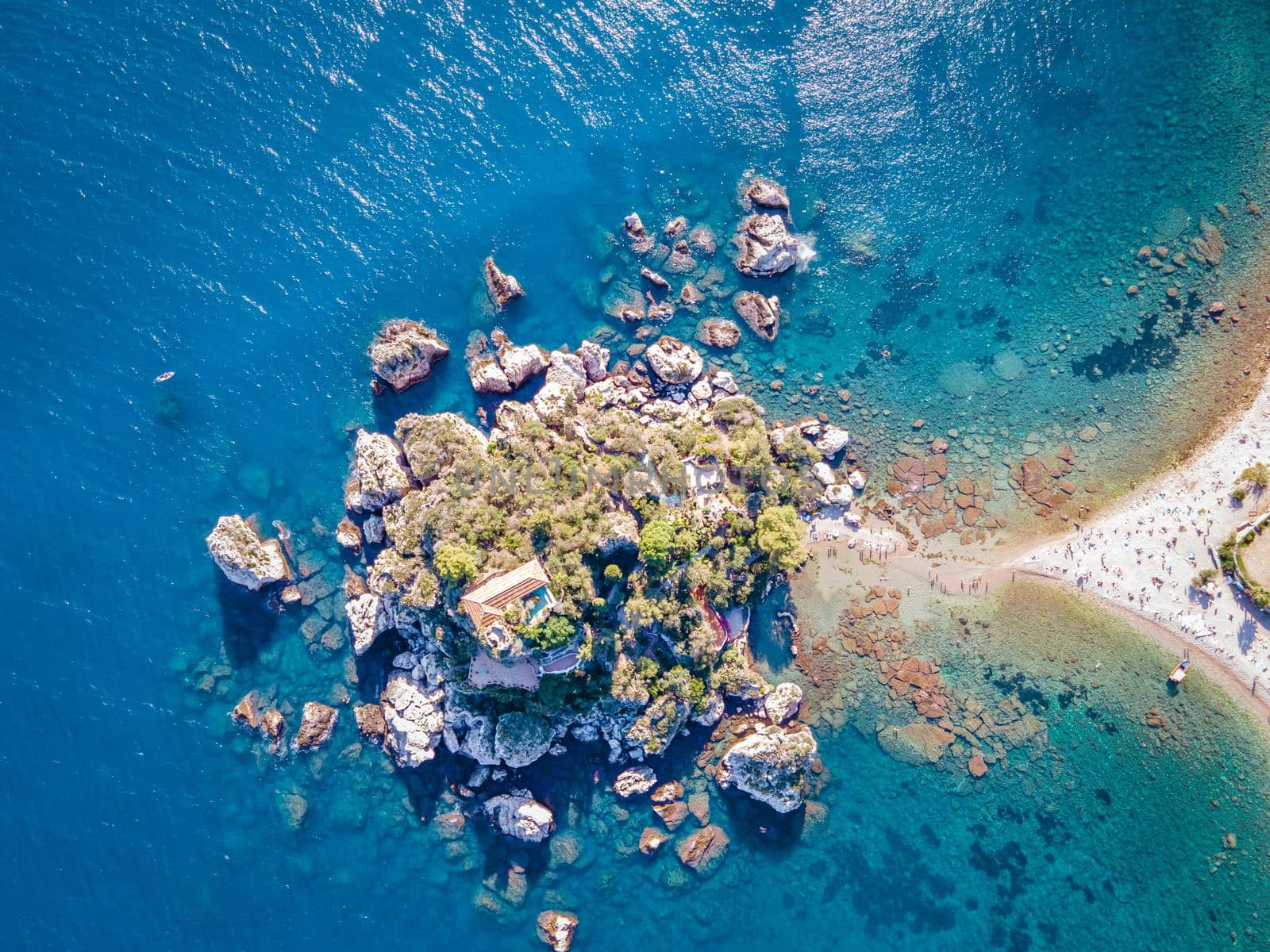 Isola Bella at Taormina, Sicily, Aerial view of island and Isola Bella beach and blue ocean water in Taormina, Sicily, Italy by fokkebok