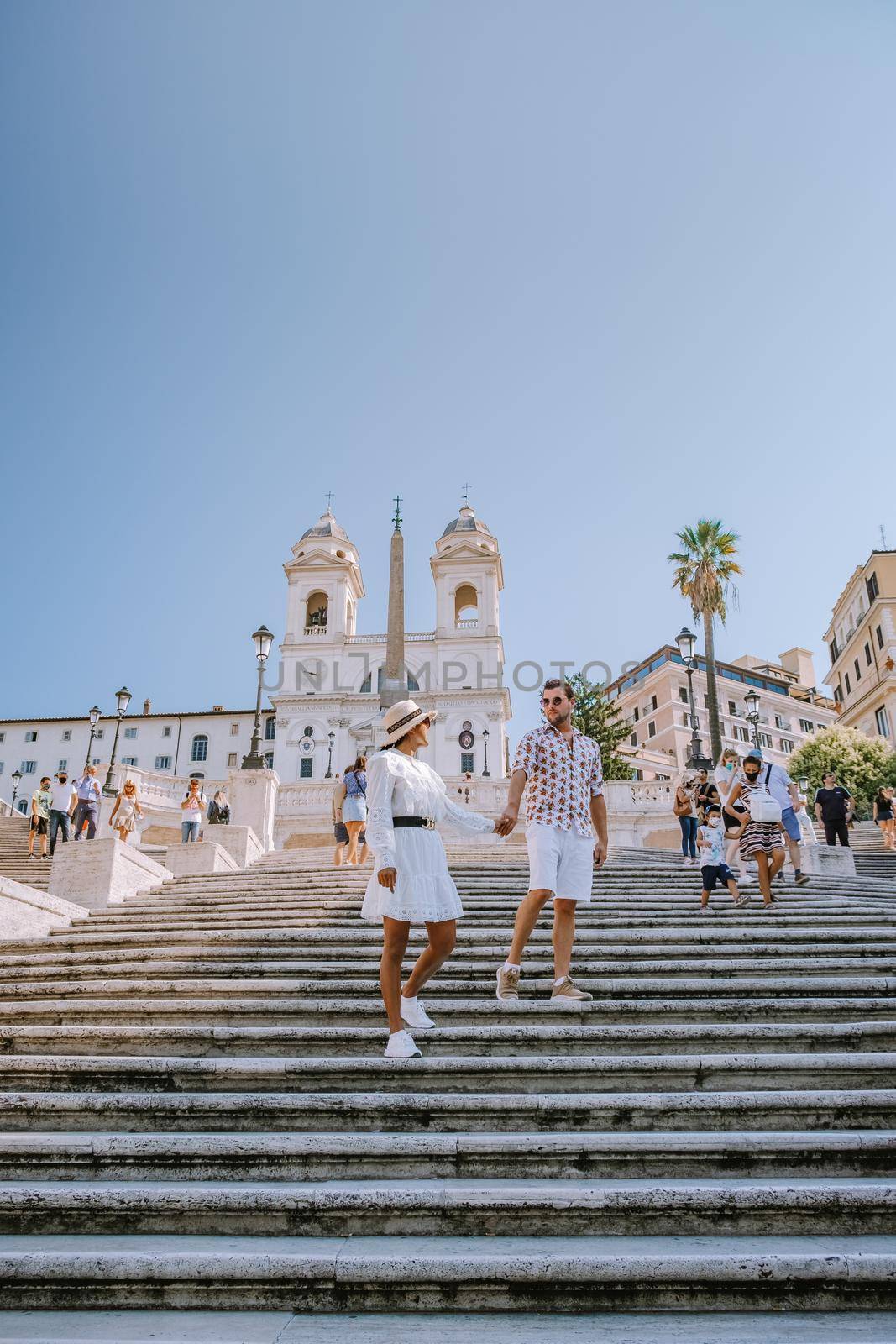 The Spanish Steps in Rome, Italy. The famous place is a great example of Roman Baroque Style. Italy couple on city trip in Rome