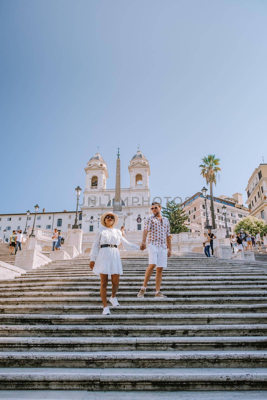 The Spanish Steps in Rome, Italy. The famous place is a great example of Roman Baroque Style. Italy couple on city trip in Rome