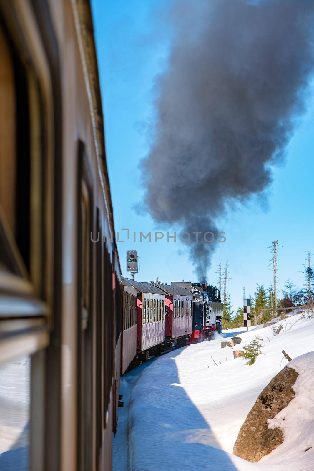 Harz national park Germany, Steam train on the way to Brocken through the winter landscape, Famous steam train through the winter mountain. Brocken, Harz National Park Mountains in Germany Europe