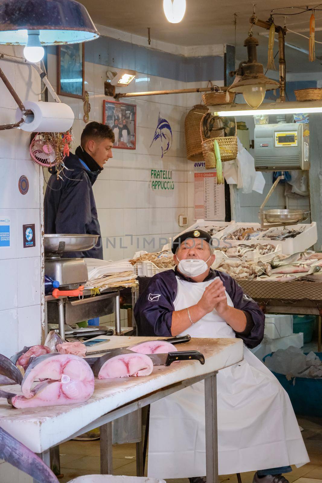 Ortigia in Syracuse Sicily Italy October 2020 in the Morning. Travel Photography from Syracuse, Italy on the island of Sicily. Cathedral Plaza and market with people wearing face protection during the 2020 pandemic covid 19 corona virus