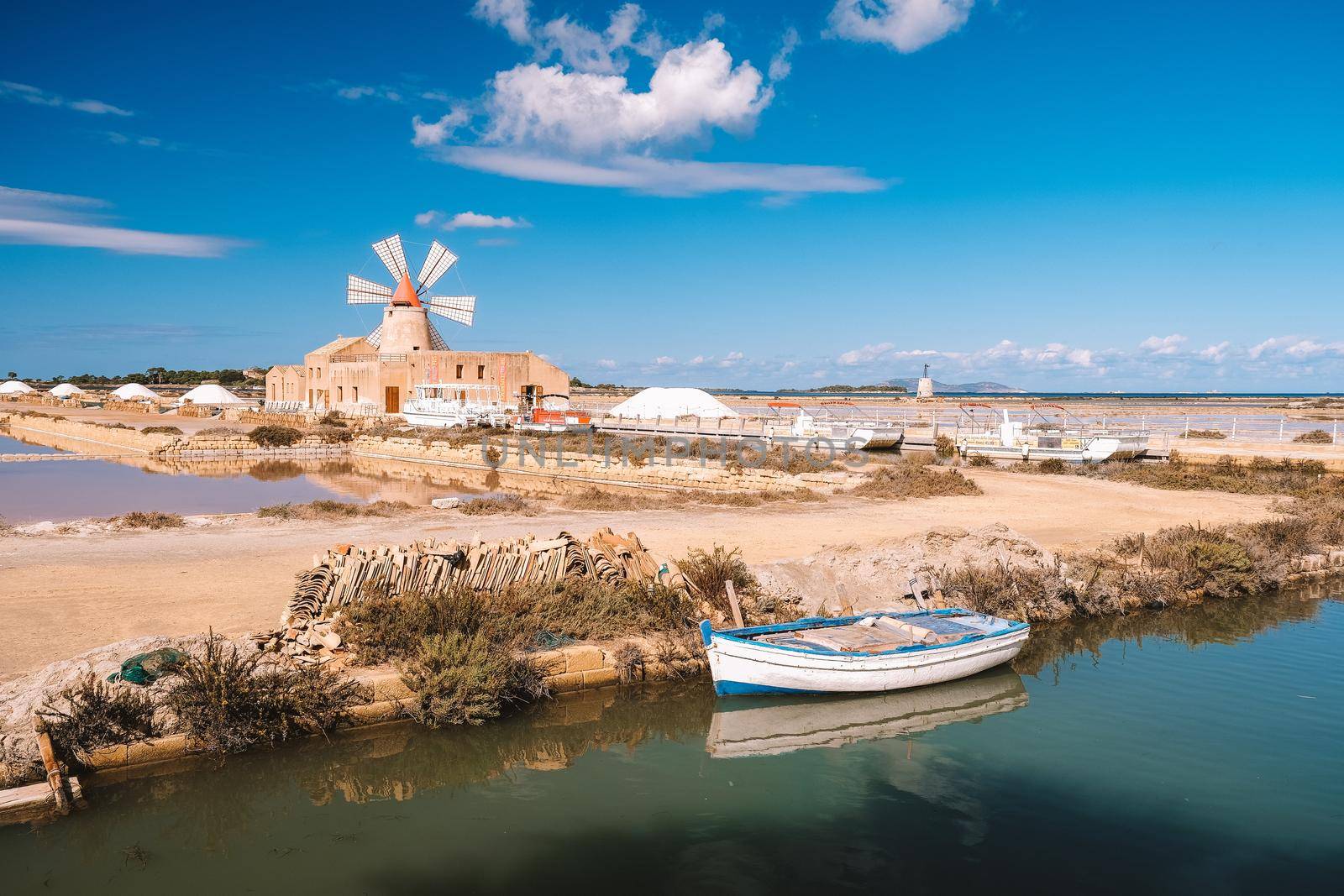 Natural reserve of the Saline dello Stagnone, near Marsala and Trapani, Sicily.,Aerial picture of Trapani salt evaporation ponds and salt mounds these ponds are filled from ocean and salt crystals are harvested as water dries up sometimes these ponds have vivid colours 