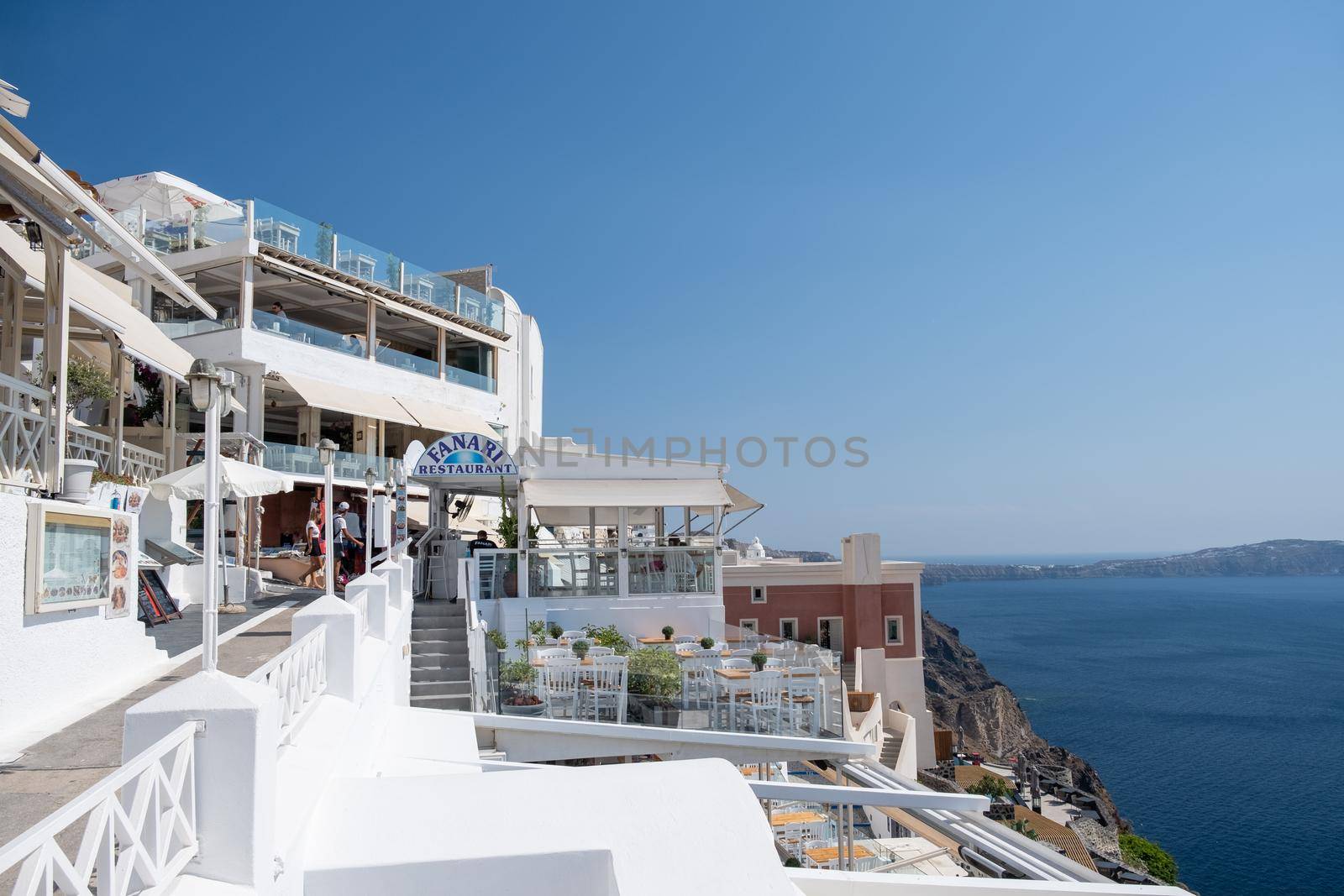 Santorini Greece August 2020,View to the sea and Volcano from Fira the capital of Santorini island in Greece by fokkebok