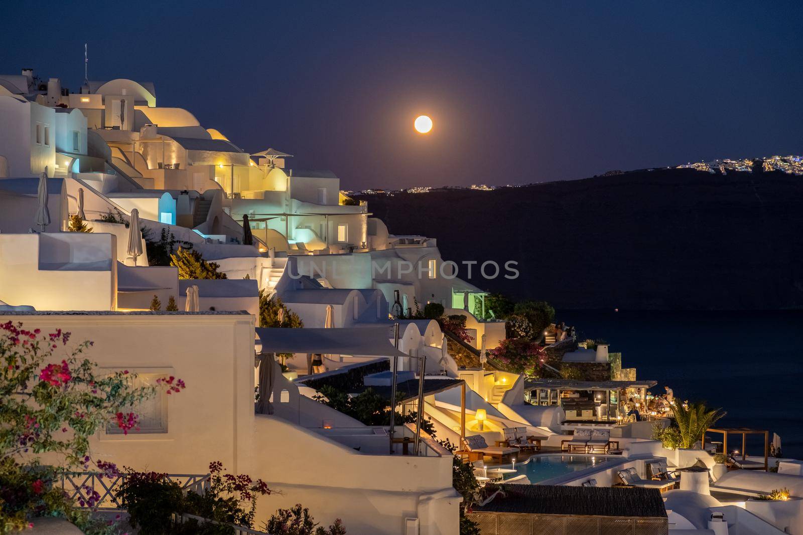 moonrise at evening at Oia Santorini Greece by fokkebok