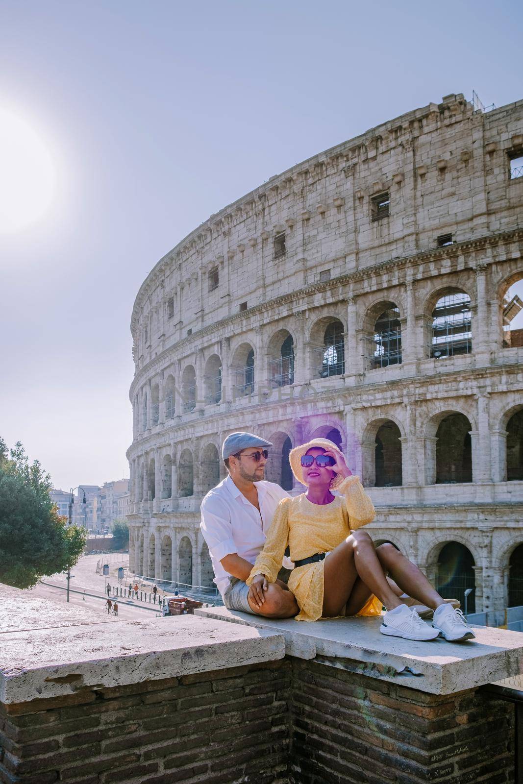 View of Colosseum in Rome and morning sun, Italy, Europe. 