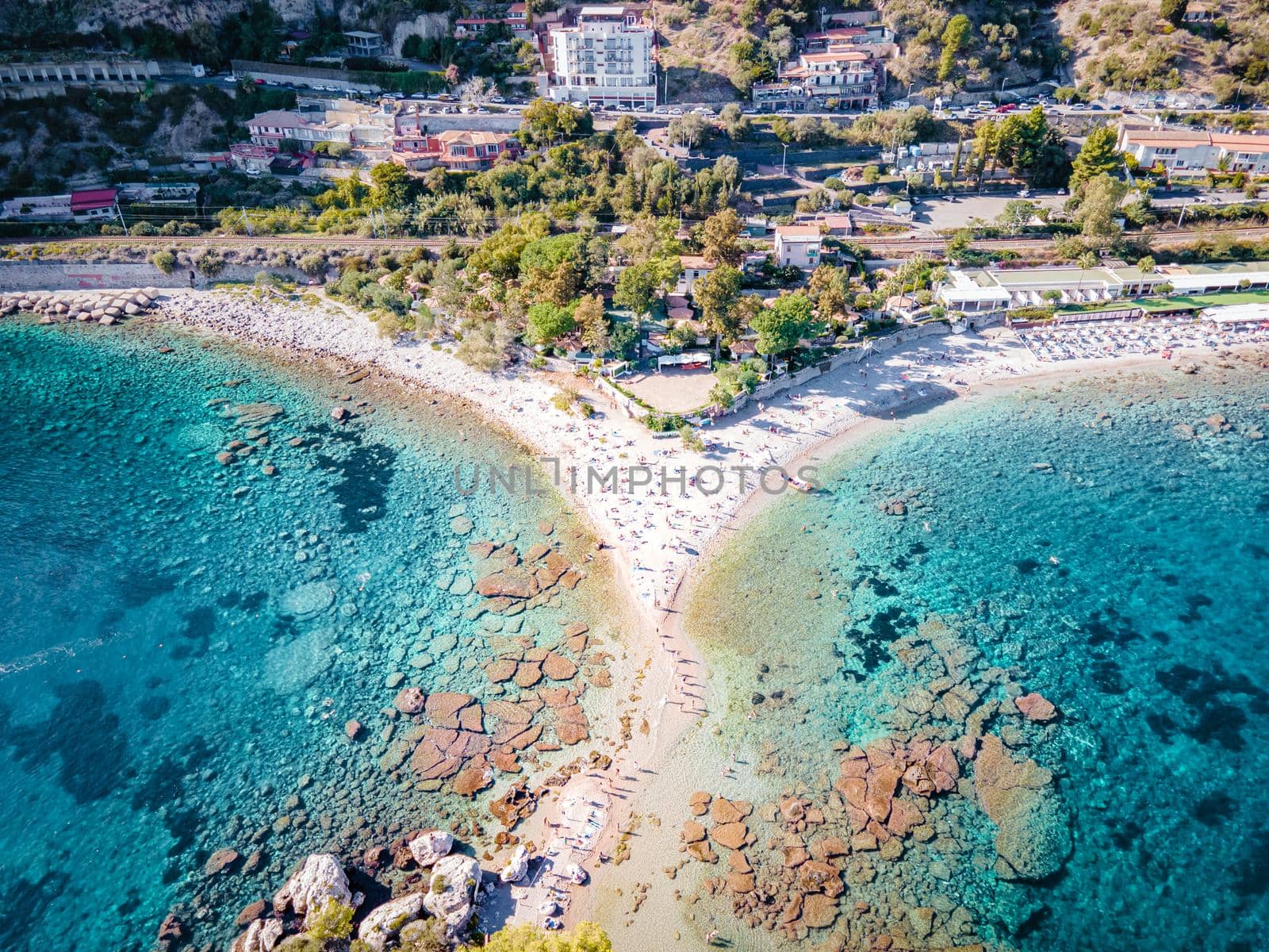 Isola Bella at Taormina, Sicily, Aerial view of island and Isola Bella beach and blue ocean water in Taormina, Sicily, Italy by fokkebok