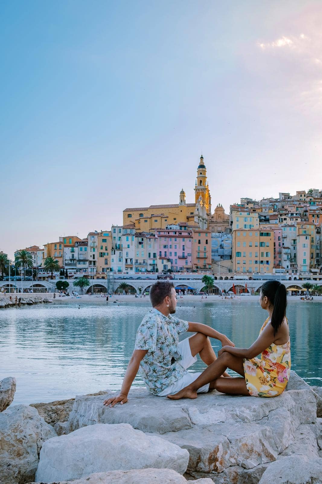 Menton France,couple men and woman on vacation at the Cote d Azur France, View on old part of Menton, Provence-Alpes-Cote d'Azur, France by fokkebok