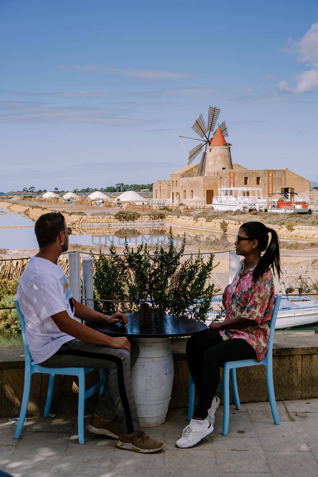 Salt Pans near Marsala, Sicily at Italy in Europe, couple visit Marsala Sicilia