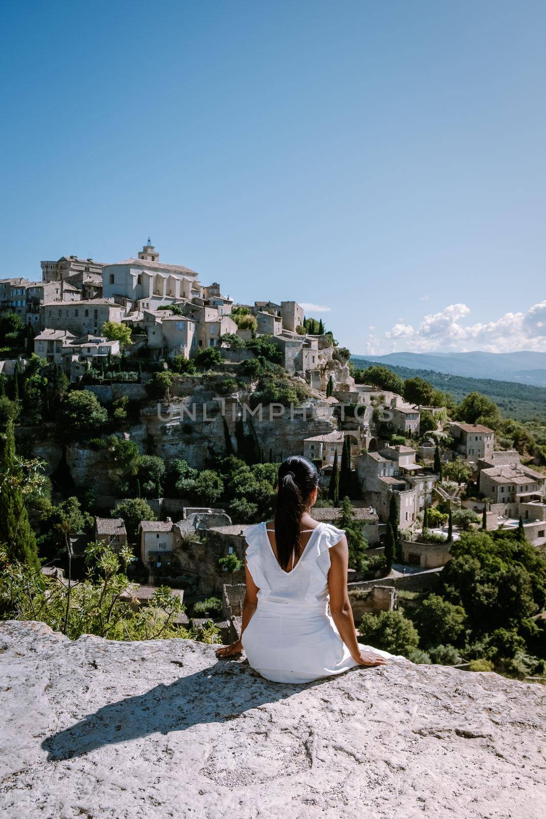 View of Gordes, a small medieval town in Provence, France. A view of the ledges of the roof of this beautiful village and landscape. Europe