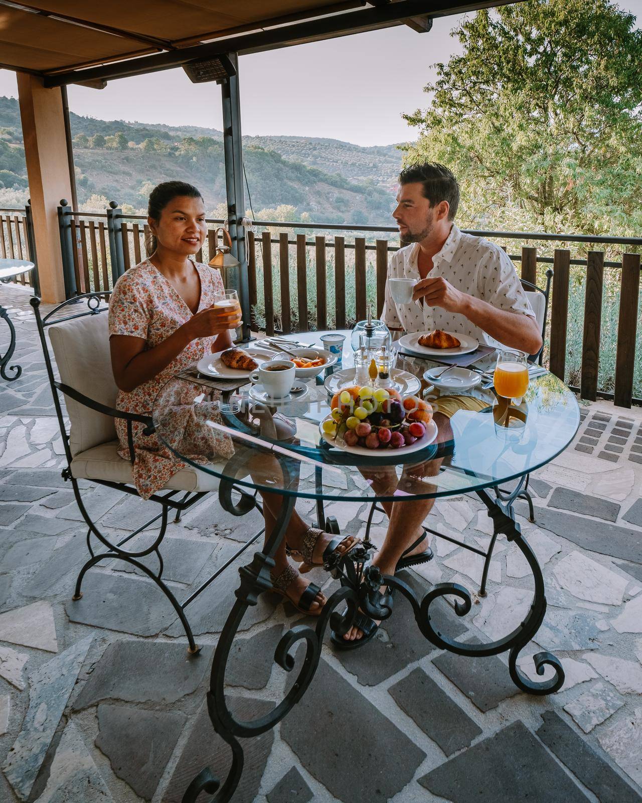 couple having breakfast at luxury villa at the Italian country side near Rome Italy by fokkebok