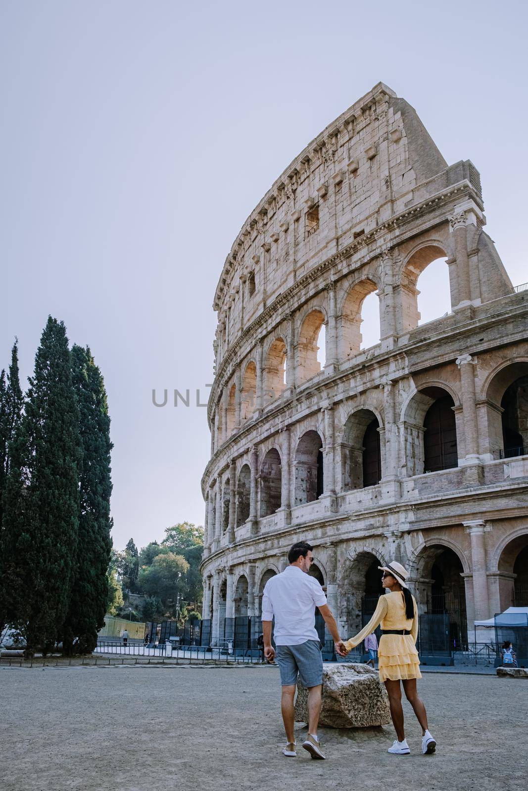 View of Colosseum in Rome and morning sun, Italy, Europe. 