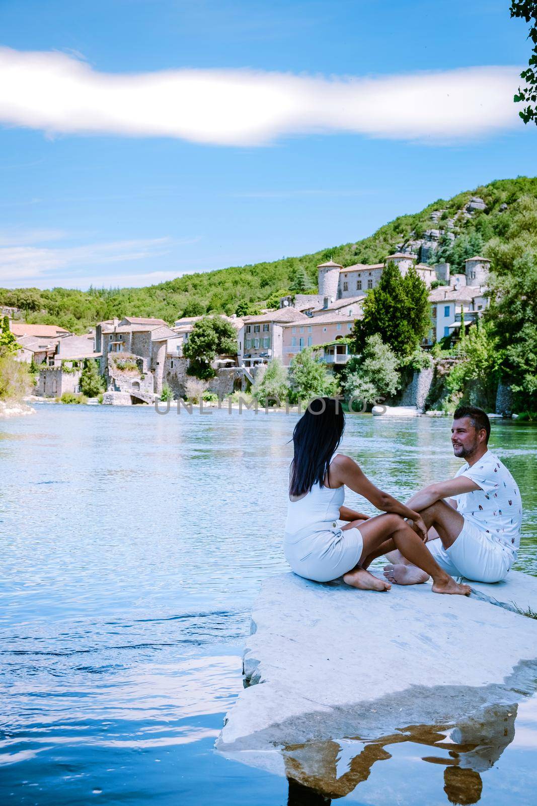 couple on vacation in Ardeche France, view of the village of Vogue in Ardeche. France by fokkebok