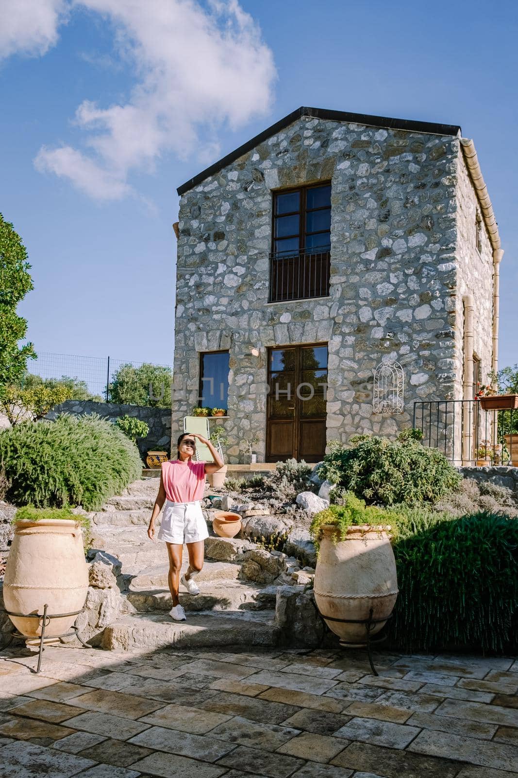 woman on vacation at Agriturismo bed and breakfast at Sicily Italy, beautiful historical old farm renovated as BB Sicilia