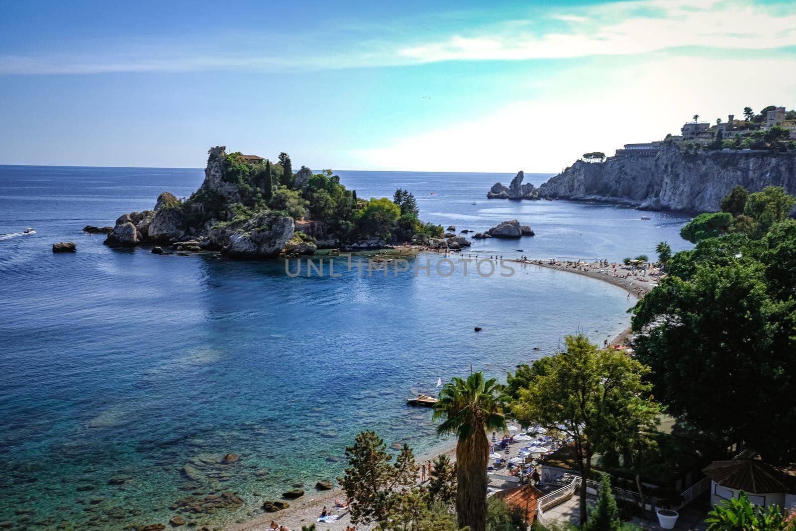 Isola Bella at Taormina, Sicily, Aerial view of island and Isola Bella beach and blue ocean water in Taormina, Sicily, Italy by fokkebok