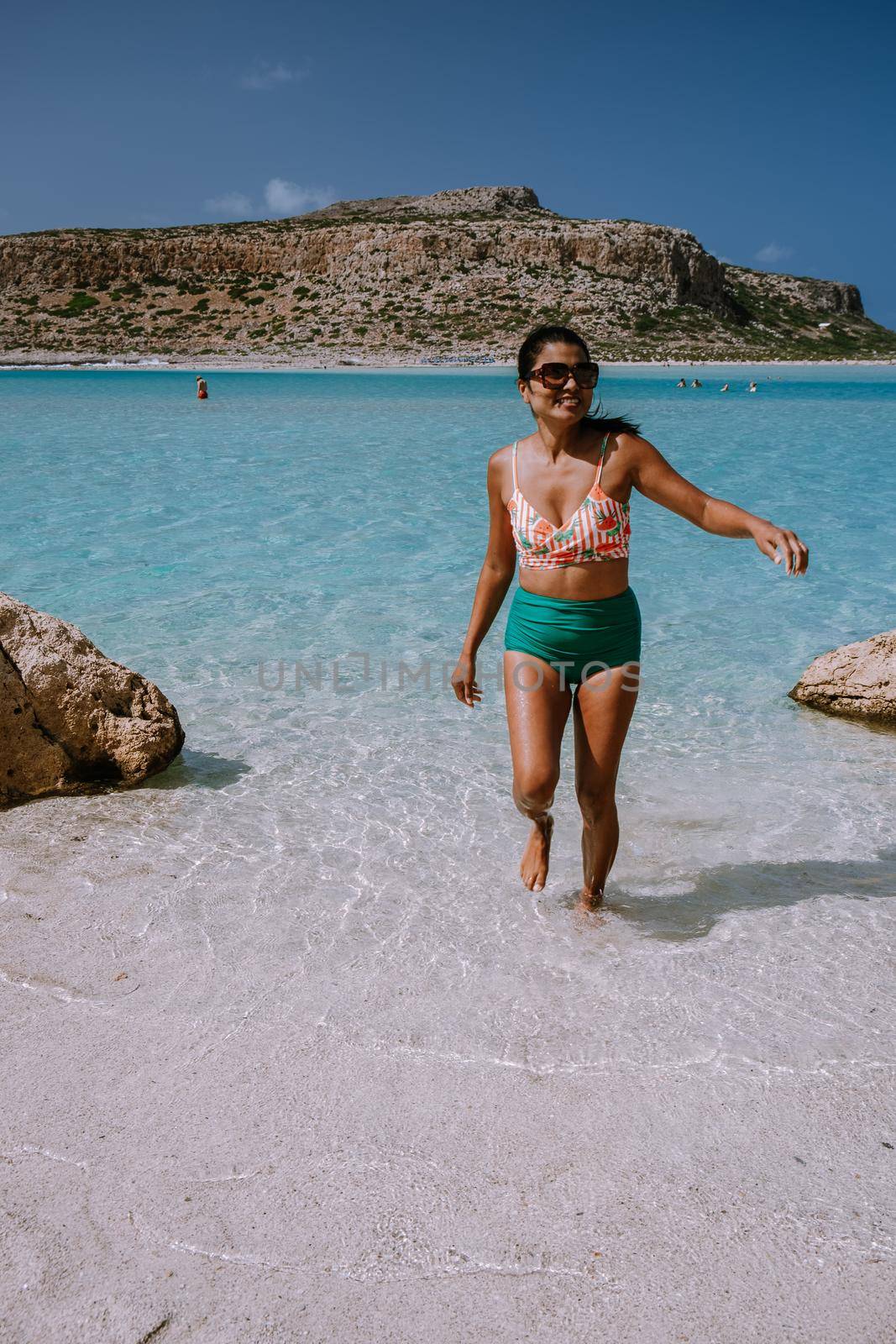 Balos Beach Crete Greece, Balos beach is on of the most beautiful beaches in Greece at the Greek Island, woman in a swimsuit on the beach