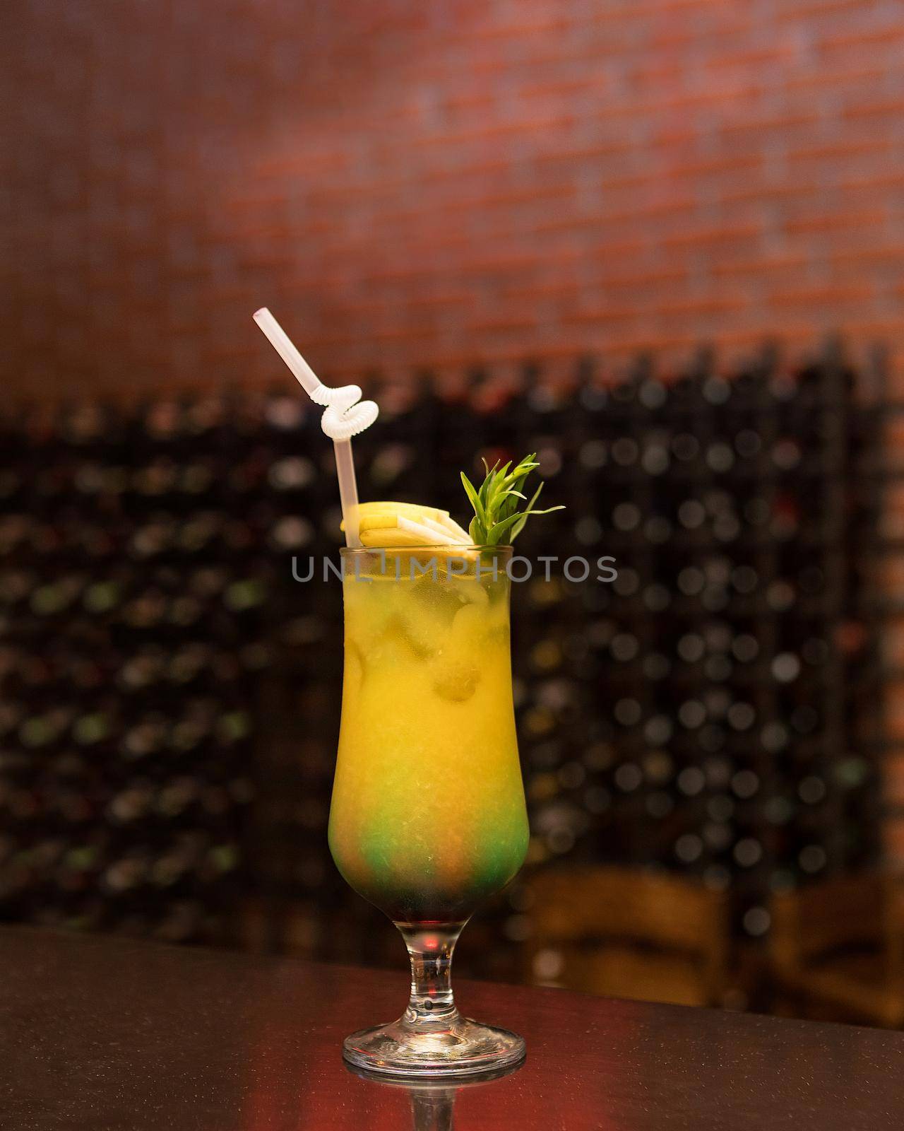 Tasty pineapple juice cocktail on table