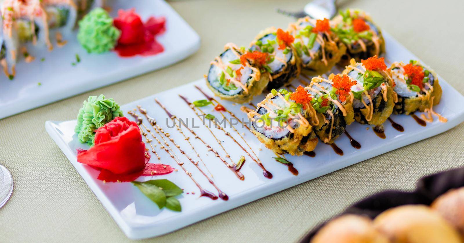 Colorful sushi roll with salmon. Japanese food