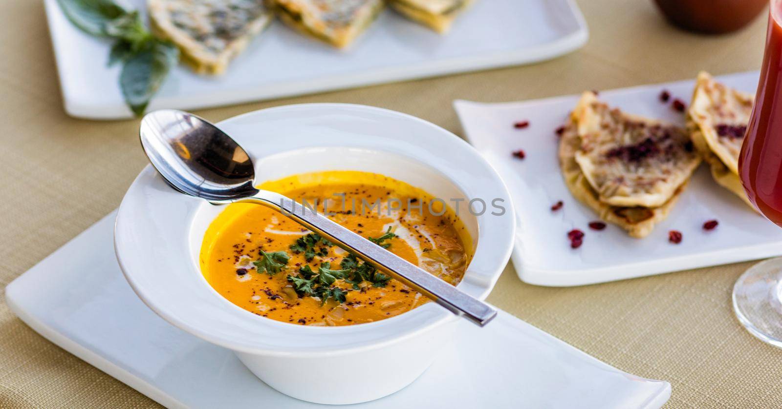 Tasty tomato soup close up by ferhad