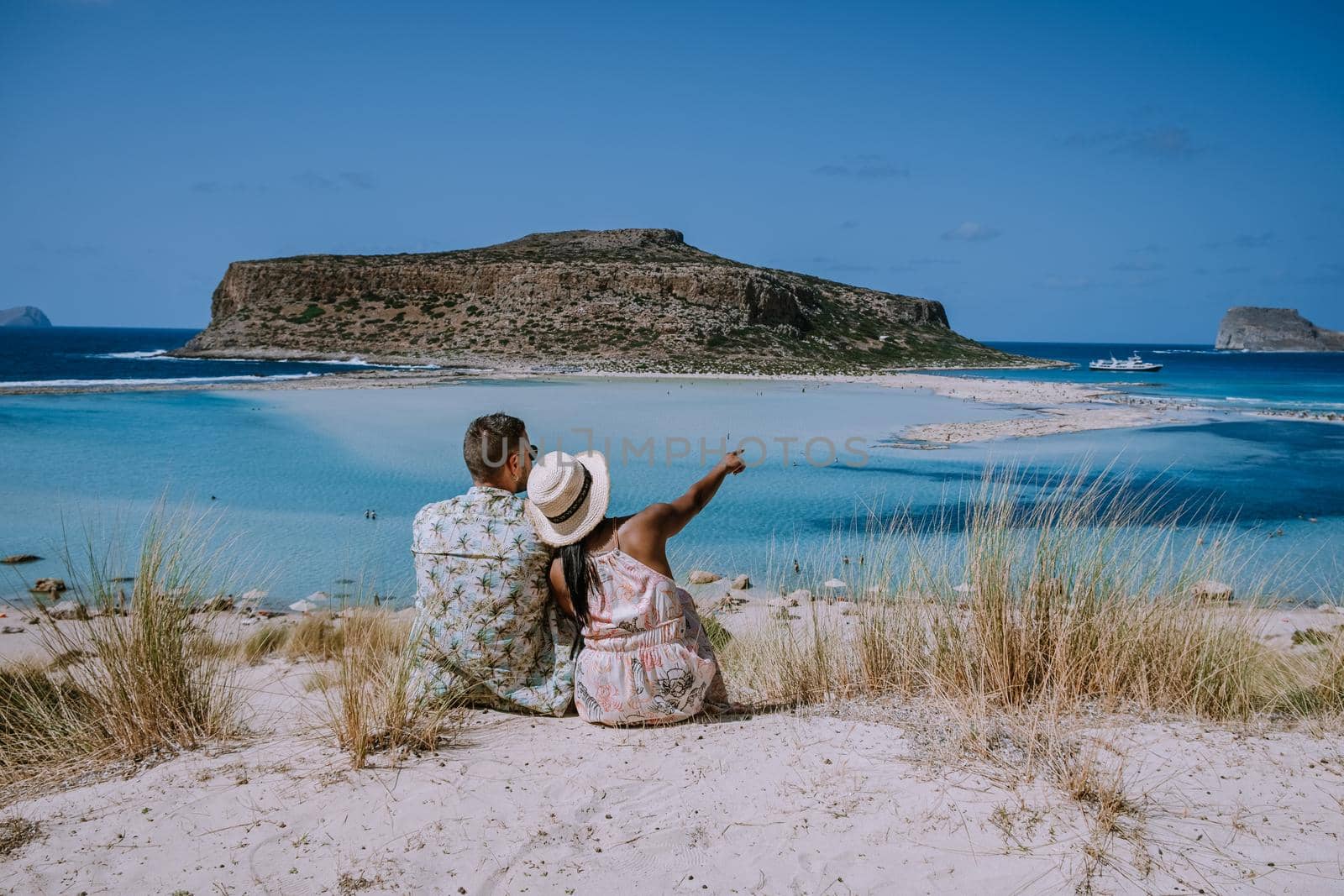 Balos Beach Cret Greece, Balos beach is on of the most beautiful beaches in Greece at the Greek Island couple visit the beach during vacation holiday in Greece