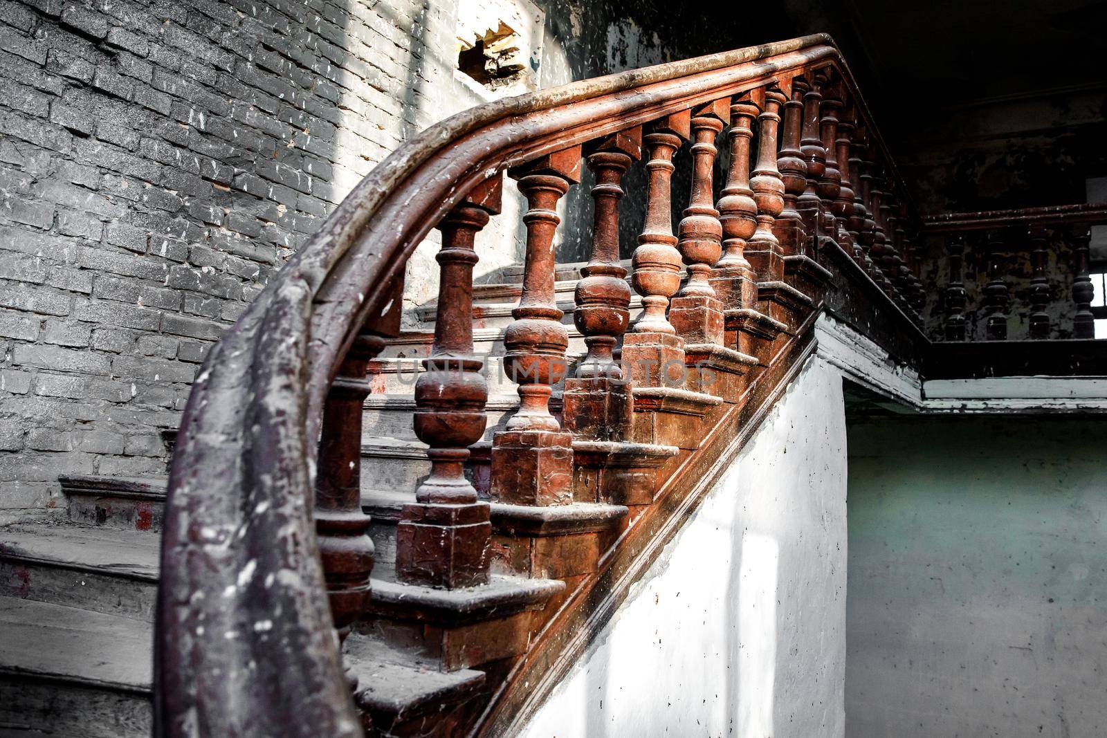 Old wooden railing of a vintage staircase