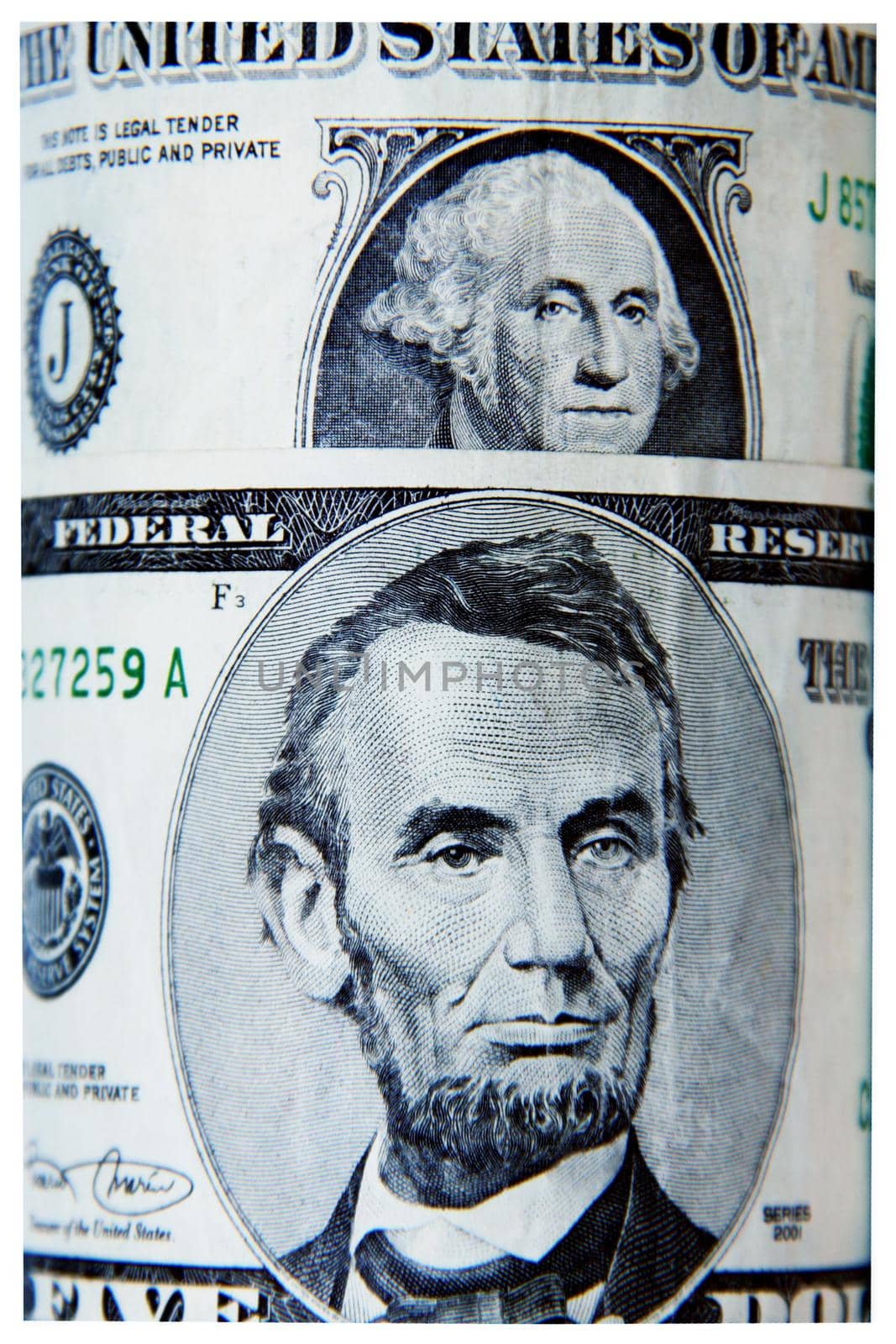 dollar bills rolled up close up by client111
