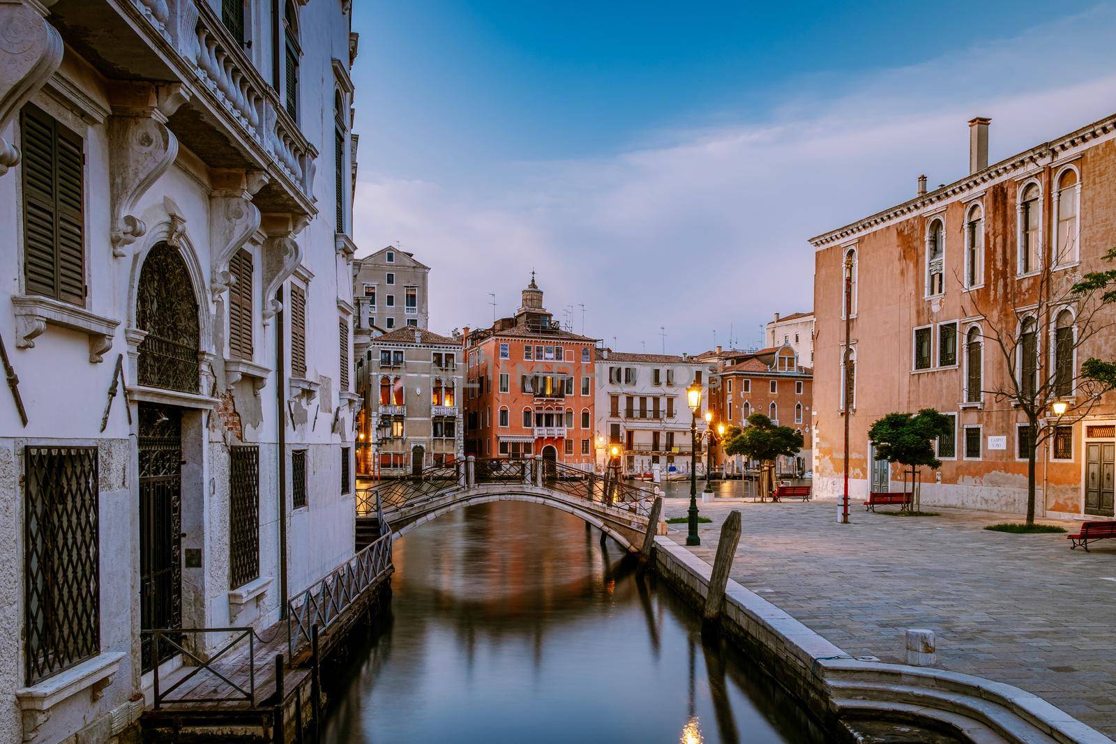 Beautiful venetian street in summer day, Italy. Venice Europe