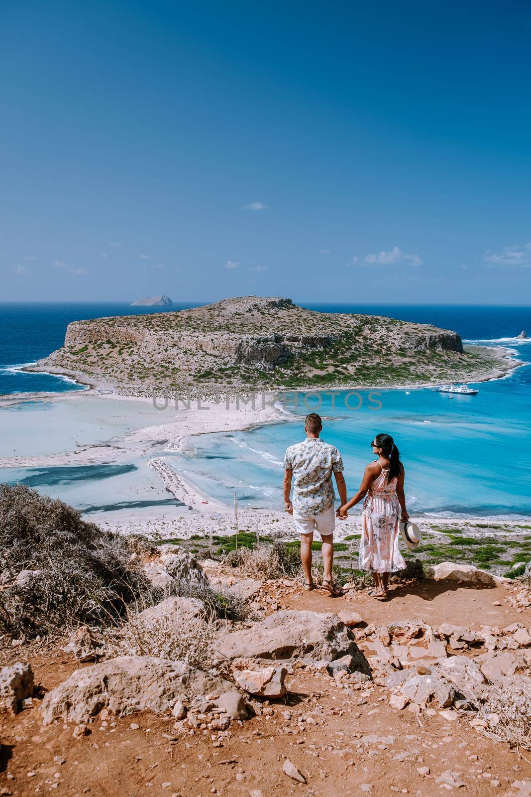 Balos Beach Cret Greece, Balos beach is on of the most beautiful beaches in Greece at the Greek Island couple visit the beach during vacation holiday in Greece