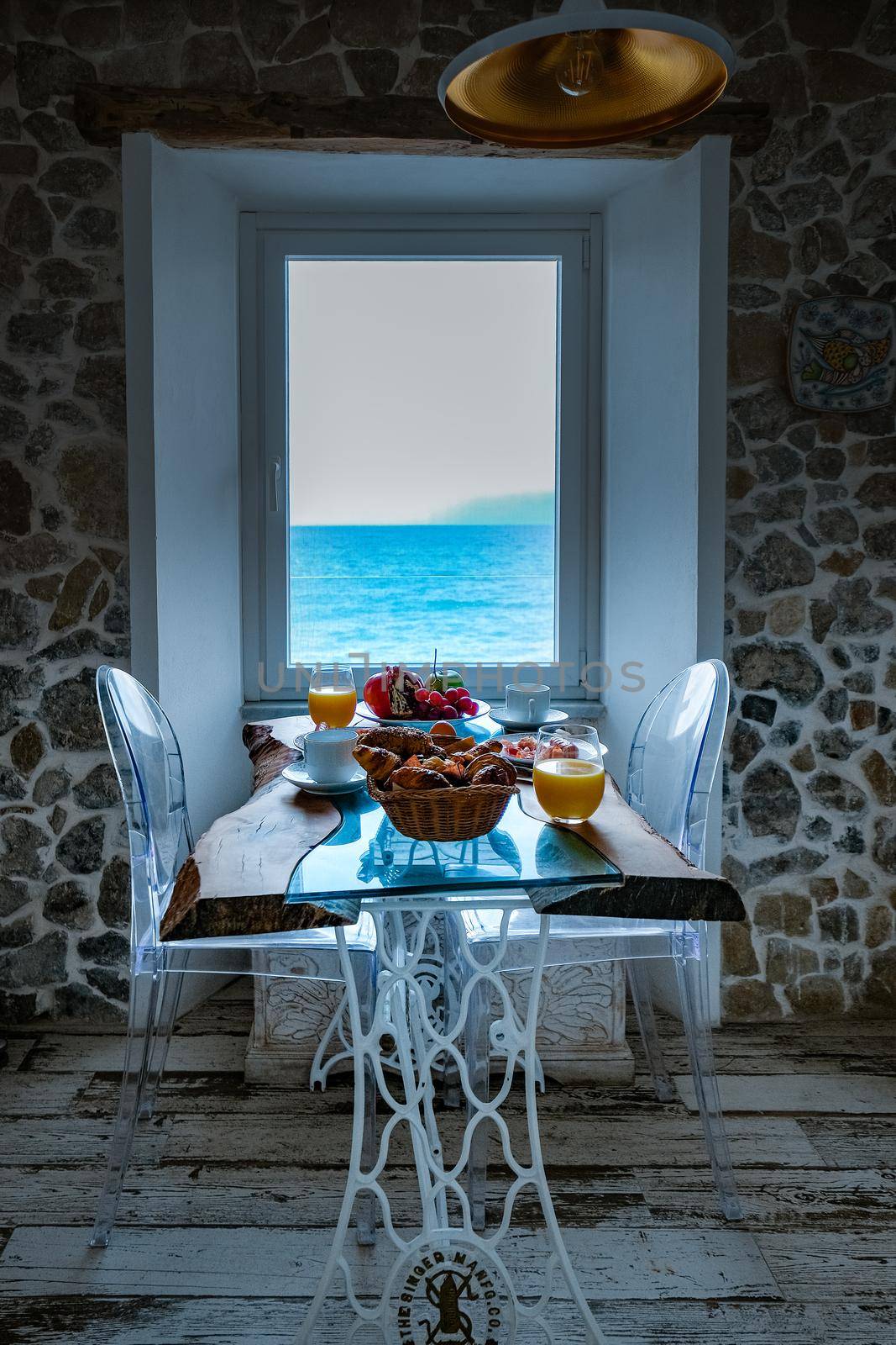 breakfast with a view over the ocean from the window, Cefalu, medieval village of Sicily island, Province of Palermo, Italy by fokkebok