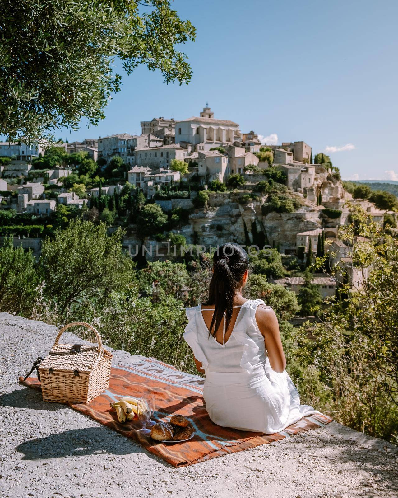 View of Gordes, a small medieval town in Provence, France. A view of the ledges of the roof of this beautiful village and landscape by fokkebok