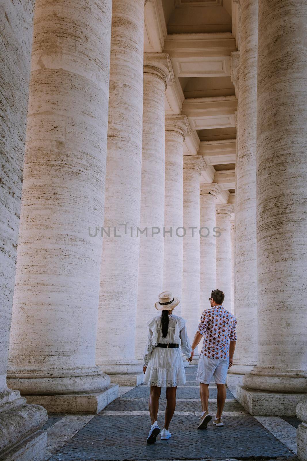 St. Peter's Basilica in the morning from Via della Conciliazione in Rome. Vatican City Rome Italy. Rome architecture and landmark. St. Peter's cathedral in Rome. Couple on city trip
