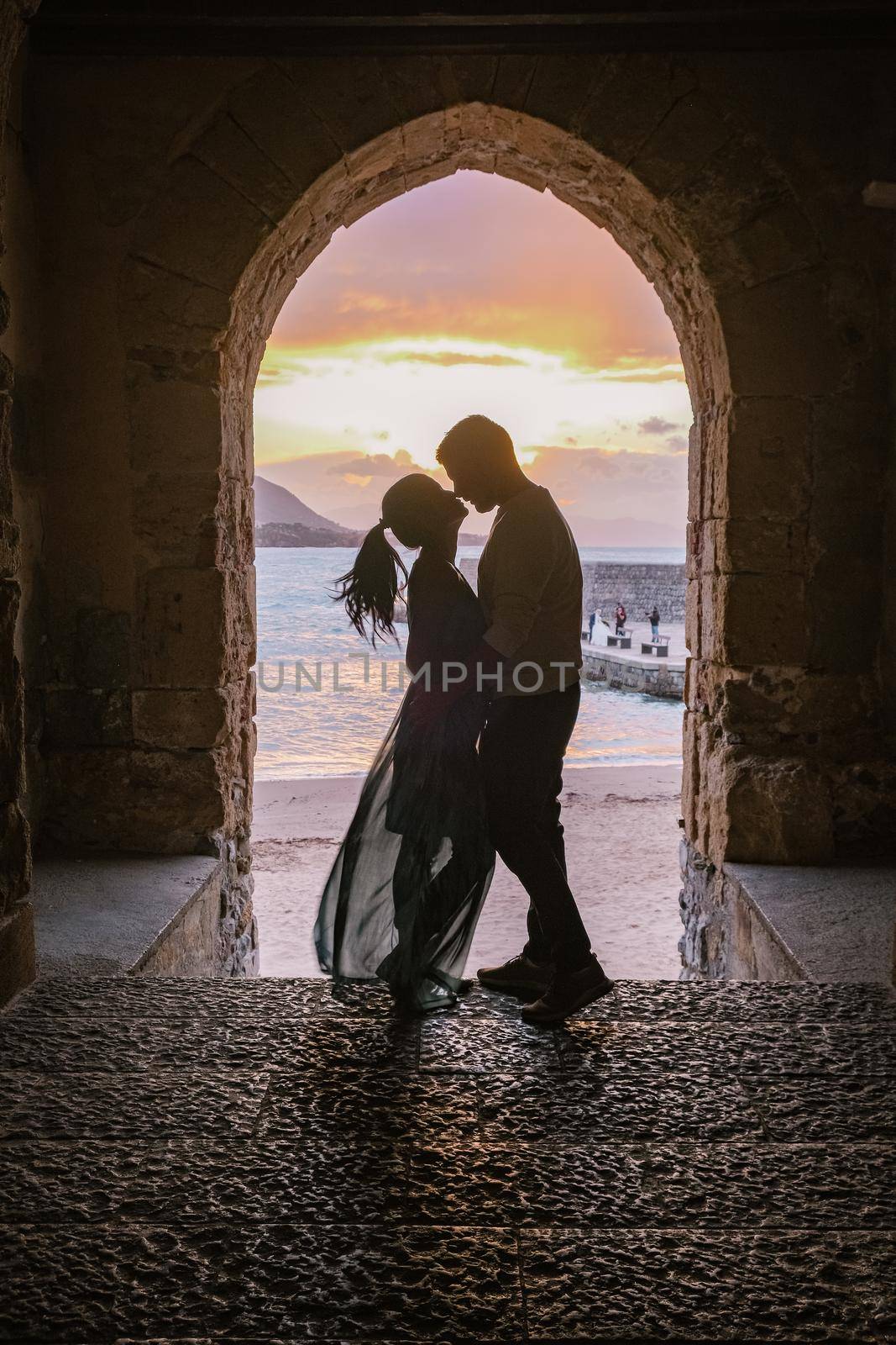 Cefalu, the medieval village of Sicily island, Province of Palermo, Italy. Europe, a couple on vacation at the Italian Island Sicilia